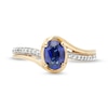 Thumbnail Image 4 of Oval Blue Lab-Created Sapphire and 1/10 CT. T.W. Diamond Bypass Ring in 10K Gold