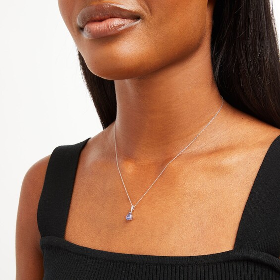 Pear-Shaped Tanzanite and 1/20 CT. T.w. Diamond Dangle Pendant in 10K White Gold