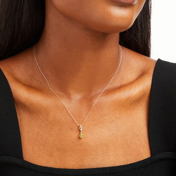 Pear-Shaped Peridot and Diamond Accent Dangle Ichthus Pendant in 10K Gold