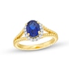Thumbnail Image 1 of Oval Blue Lab-Created Sapphire and 1/5 CT. T.W. Diamond Frame Rope Shank Ring in 14K Gold