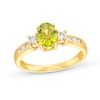 Thumbnail Image 0 of Oval Peridot and 1/4 CT. T.W. Diamond Three Stone Ring in 14K Gold