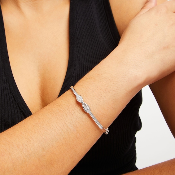 1/5 CT. T.w. Diamond Infinity Overlay Bangle in Sterling Silver