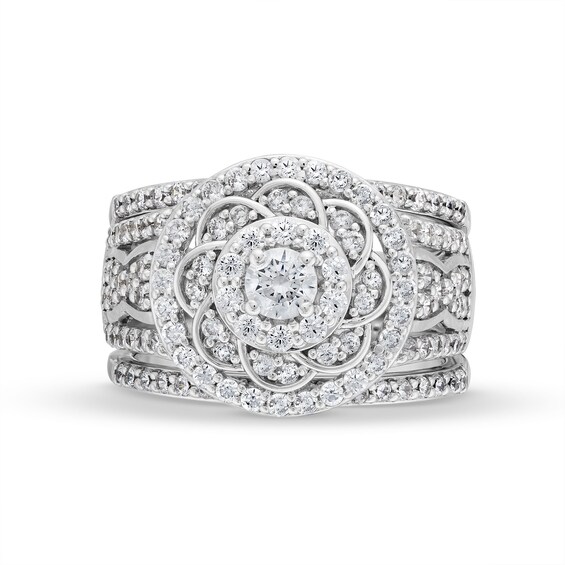 1-1/2 CT. T.w. Diamond Frame Celtic-Style Flower Bridal Set in 10K White Gold