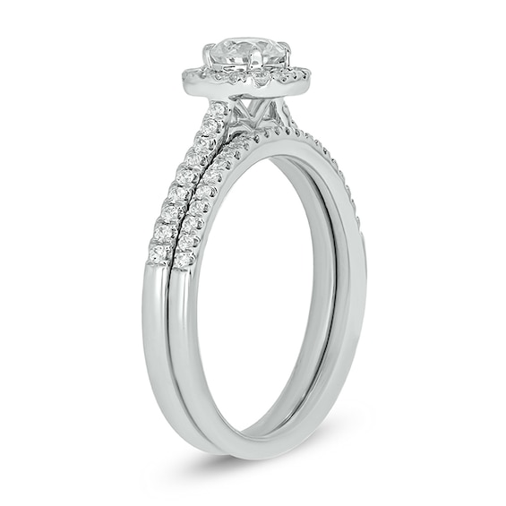 3/4 CT. T.w. Diamond Cushion Frame Hidden Infinity Bridal Set in 10K White Gold