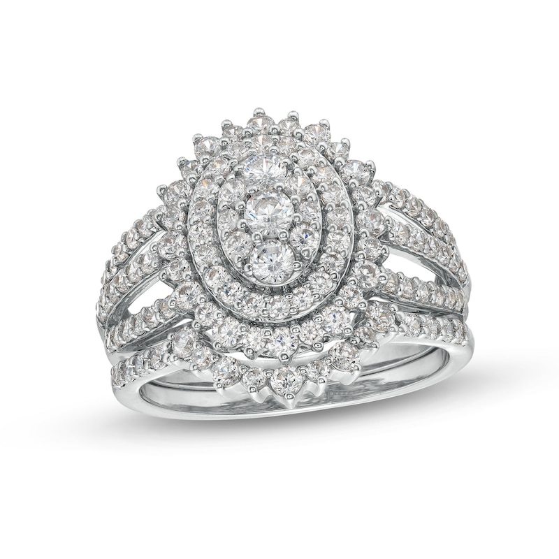 Main Image 1 of 1-1/4 CT. T.W. Oval Multi-Diamond Sunburst Frame Split Shank Bridal Set in 10K White Gold