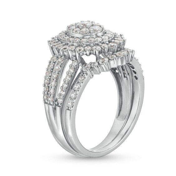 1-1/4 CT. T.w. Oval Multi-Diamond Sunburst Frame Split Shank Bridal Set in 10K White Gold