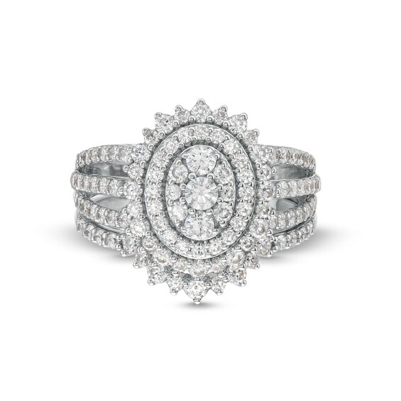 1-1/4 CT. T.w. Oval Multi-Diamond Sunburst Frame Split Shank Bridal Set in 10K White Gold