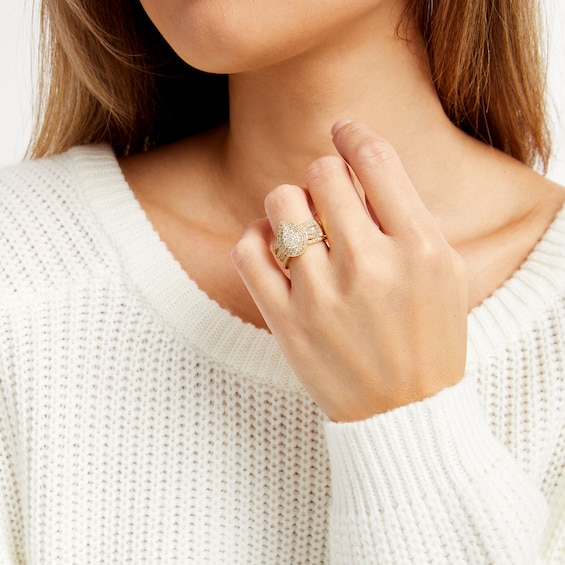 1-1/4 CT. T.w. Pear Multi-Diamond Teardrop Bow-Tie Bridal Set in 10K Gold