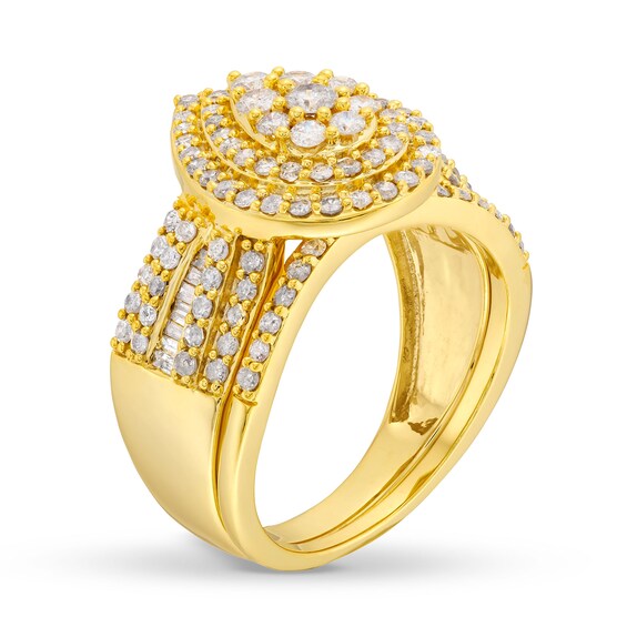 1-1/4 CT. T.w. Pear Multi-Diamond Teardrop Bow-Tie Bridal Set in 10K Gold