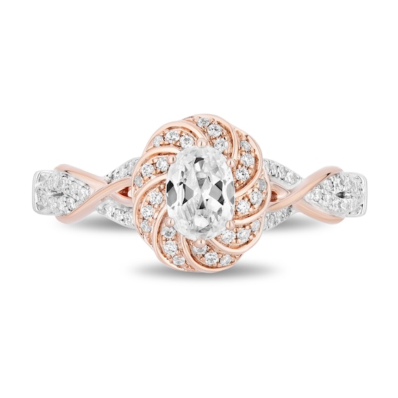 Enchanted Disney Rapunzel 3/4 CT. T.w. Oval Diamond Braid Frame Engagement Ring in 14K Two-Tone Gold (I/I1)