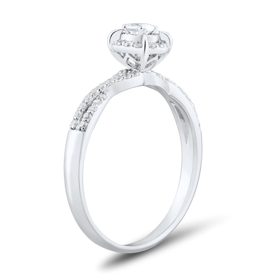 1/4 CT. T.w. Oval Diamond Frame Criss-Cross Engagement Ring in 10K White Gold