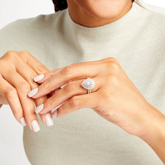 1-1/2 CT. T.w. Pear-Shaped Diamond Teardrop Double Frame Bridal Set in 10K Gold