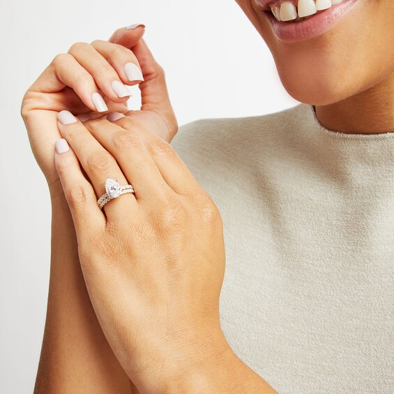 4-3/8 CT. T.w. Pear-Shaped Lab-Grown Diamond Hidden Halo Bridal Set in 14K Gold (I/Si2)