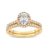 Thumbnail Image 1 of 1-1/3 CT. T.W. Oval Lab-Grown Diamond Frame Bridal Set in 14K Gold (F/SI2)
