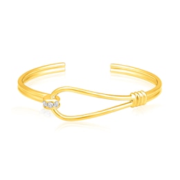 1/4 CT. T.W. Diamond Sideways Slip Knot Cuff in Sterling Silver with 14K Gold Plate - 8.0"