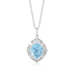 Oval Sky Blue Topaz and 1/8 CT. T.W. Diamond Tilted Frame Pendant in 10K White Gold