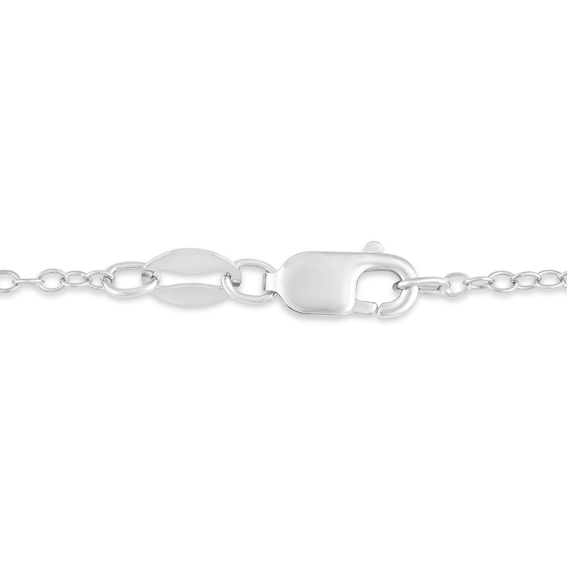 Main Image 4 of Oval Sky Blue Topaz and 1/8 CT. T.W. Diamond Tilted Frame Pendant in 10K White Gold