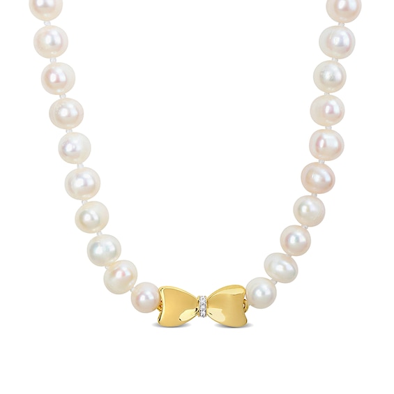 Eternally Bonded 7.0-7.5mm Freshwater Cultured Pearl Strand and 1/20 CT. T.w. Diamond Bow Stretch Necklace with 10K Gold-17"
