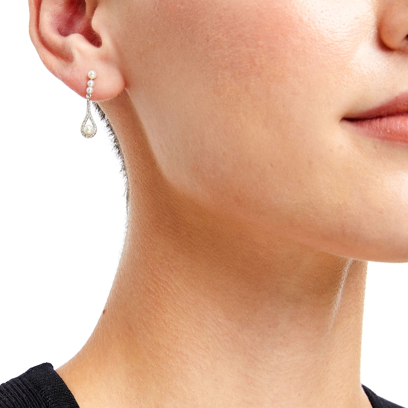 Main Image 2 of Freshwater Cultured Pearl and 1/6 CT. T.W. Diamond Three Stone Teardrop Earrings in 10K White Gold