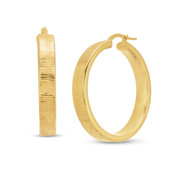 Diamond-Cut 6.0mm Oval Hoop Earrings in Hollow 14K Gold