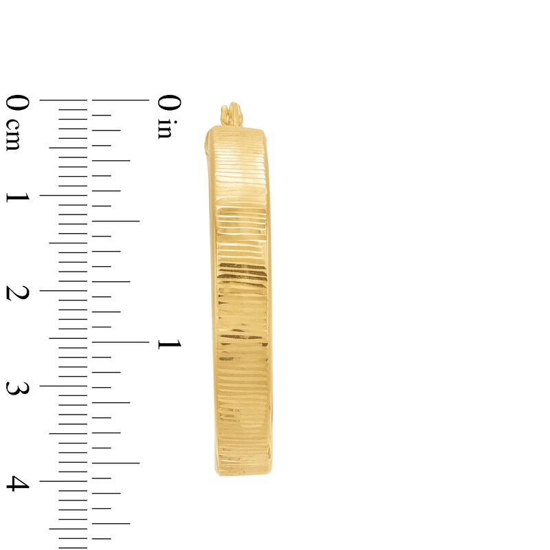 Main Image 3 of Diamond-Cut 6.0mm Oval Hoop Earrings in Hollow 14K Gold