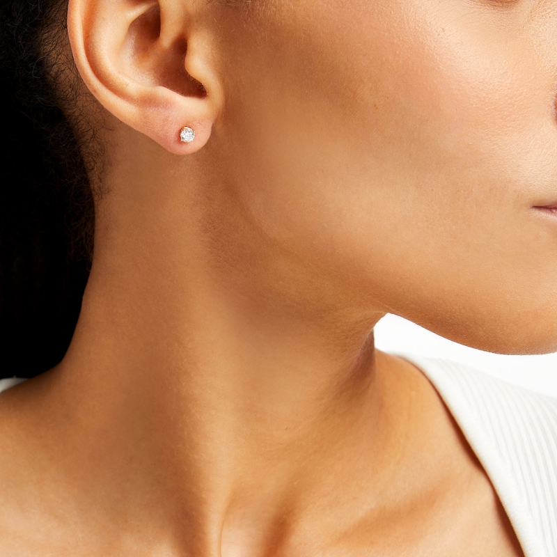 Main Image 2 of 1/2 CT. T.W. Diamond Solitaire Stud Earrings in 10K Gold (J/I3)
