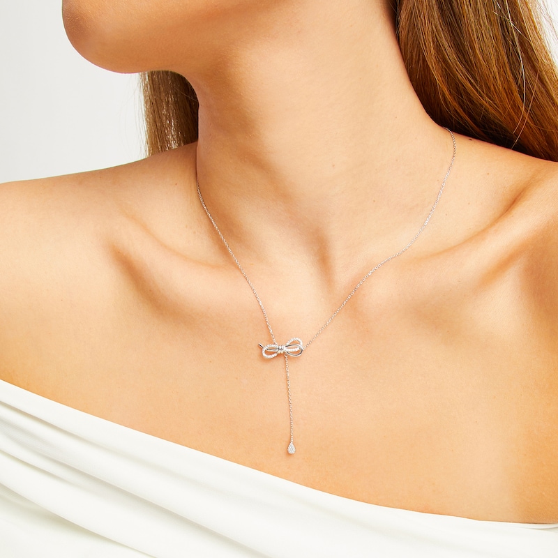 Main Image 2 of 1/5 CT. T.W. Diamond Bow with Teardrop Lariat Necklace in Sterling Silver