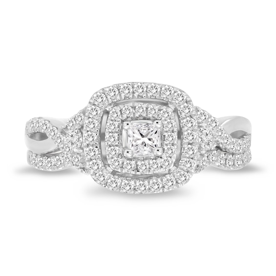 3/4 CT. T.w. Princess-Cut Diamond Cushion Frame Twist Shank Bridal Set in 10K White Gold (I/I2)