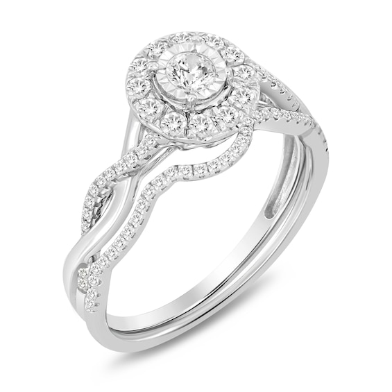 1/2 CT. T.w. Diamond Frame Twist Shank Bridal Set in 10K White Gold (I/I2)