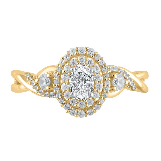 5/8 CT. T.w. Oval Diamond Double Frame Twist Shank Ring in 10K Gold