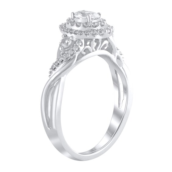 5/8 CT. T.w. Oval Diamond Double Frame Twist Shank Ring in 10K White Gold