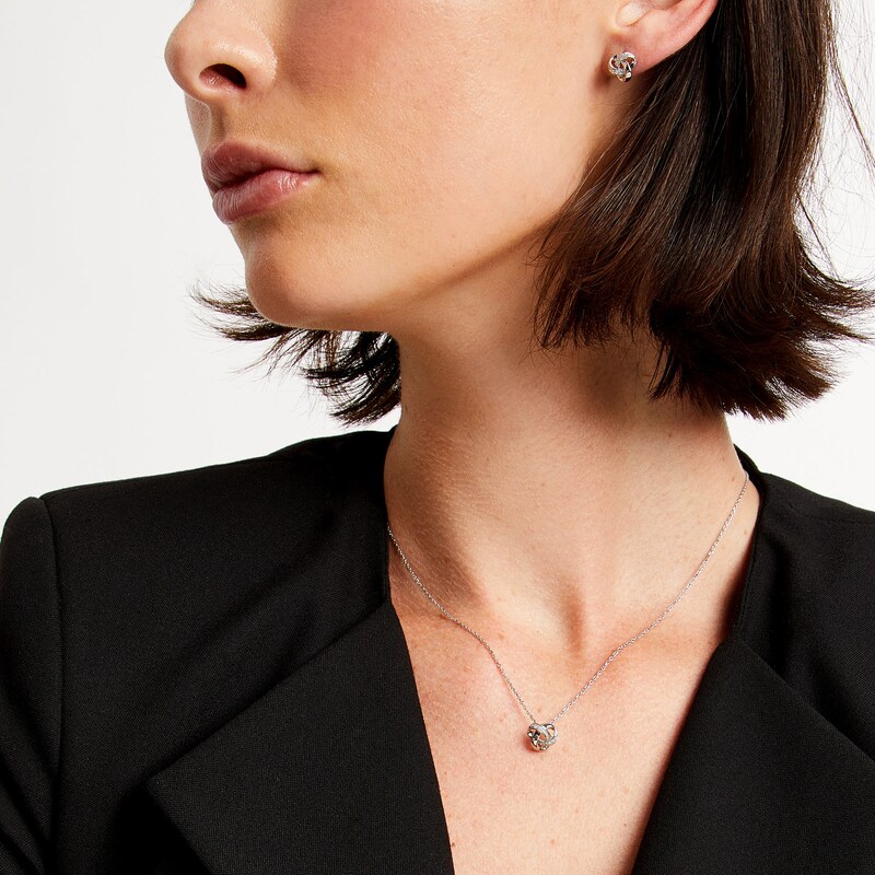 Main Image 2 of 1/10 CT. T.W. Diamond Loose Love Knot Pendant and Stud Earrings Set in Sterling Silver