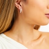 Thumbnail Image 1 of 1 CT. T.W. Diamond Channel-Set Huggie Hoop Earrings in 10K White Gold