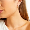 Thumbnail Image 2 of 1/2 CT. T.W. Diamond Channel-Set Huggie Hoop Earrings in 10K Gold