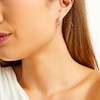 Thumbnail Image 2 of 1/2 CT. T.W. Diamond Channel-Set Huggie Hoop Earrings in 10K White Gold