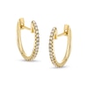 Thumbnail Image 0 of 1/10 CT. T.W. Diamond Huggie Hoop Earrings in 10K Gold