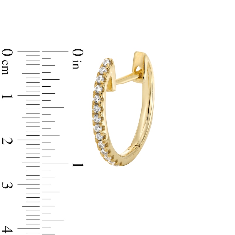 1/10 CT. T.W. Diamond Huggie Hoop Earrings in 10K Gold