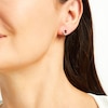 Thumbnail Image 2 of Oval Garnet and White Lab-Created Sapphire Frame Stud Earrings in Sterling Silver