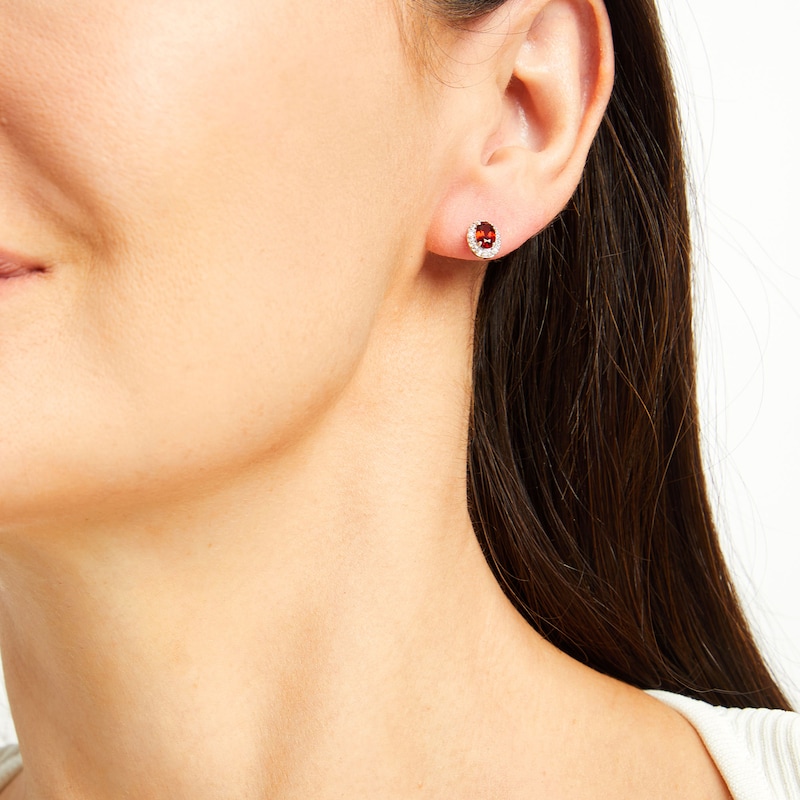 Main Image 2 of Oval Garnet and White Lab-Created Sapphire Frame Stud Earrings in Sterling Silver