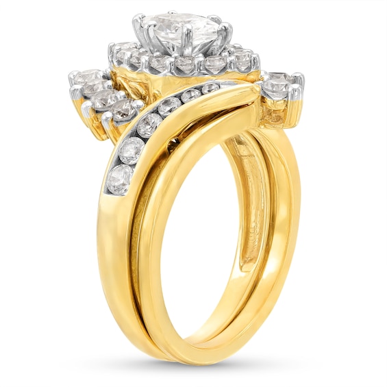 1-1/2 CT. T.w. Marquise Diamond Shadow Frame Bypass Shank Bridal Set in 14K Gold