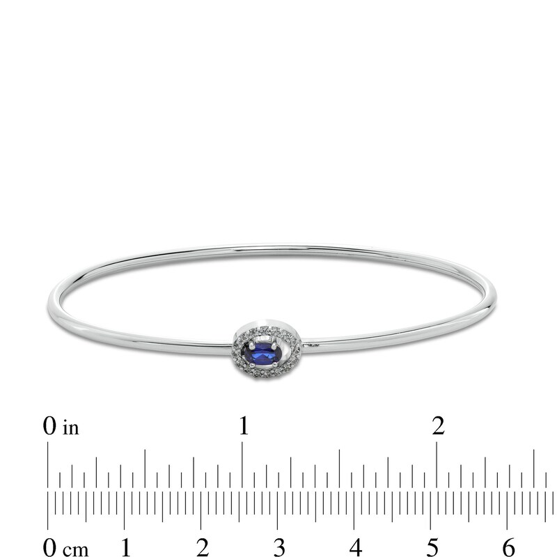 Sideways Oval Blue and White Lab-Created Sapphire Frame Flexible Bangle in Sterling Silver