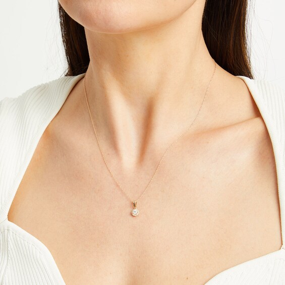 1/4 CT. T.w. Diamond Round Frame Pendant in 10K Gold