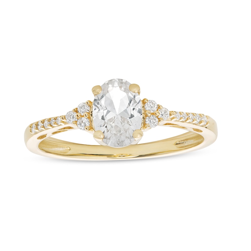 Main Image 1 of Oval White Lab-Created Sapphire and 1/10 CT. T.W. Diamond Ring in 10K Gold