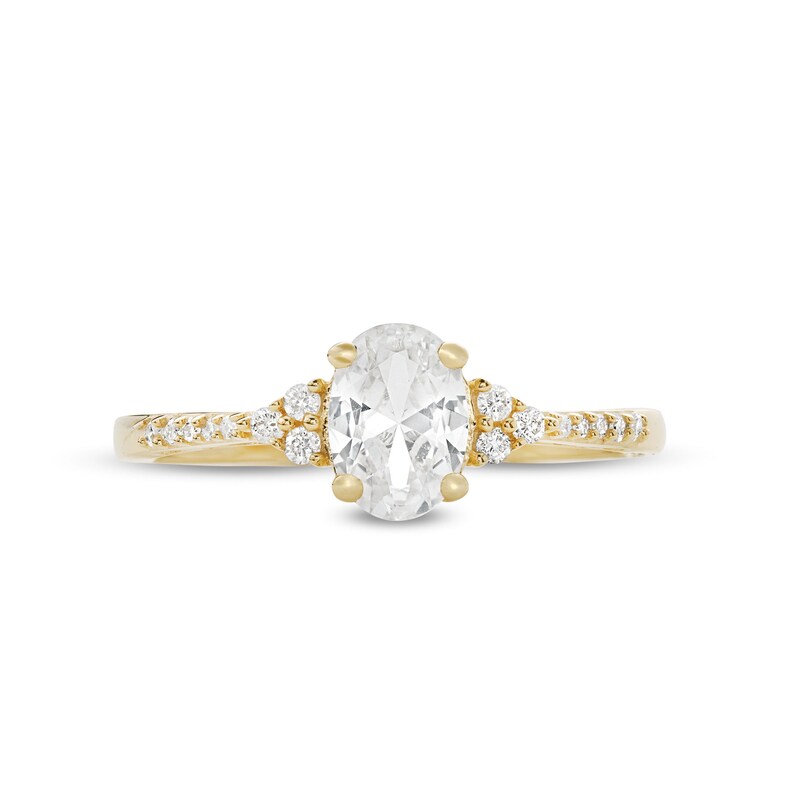 Main Image 4 of Oval White Lab-Created Sapphire and 1/10 CT. T.W. Diamond Ring in 10K Gold
