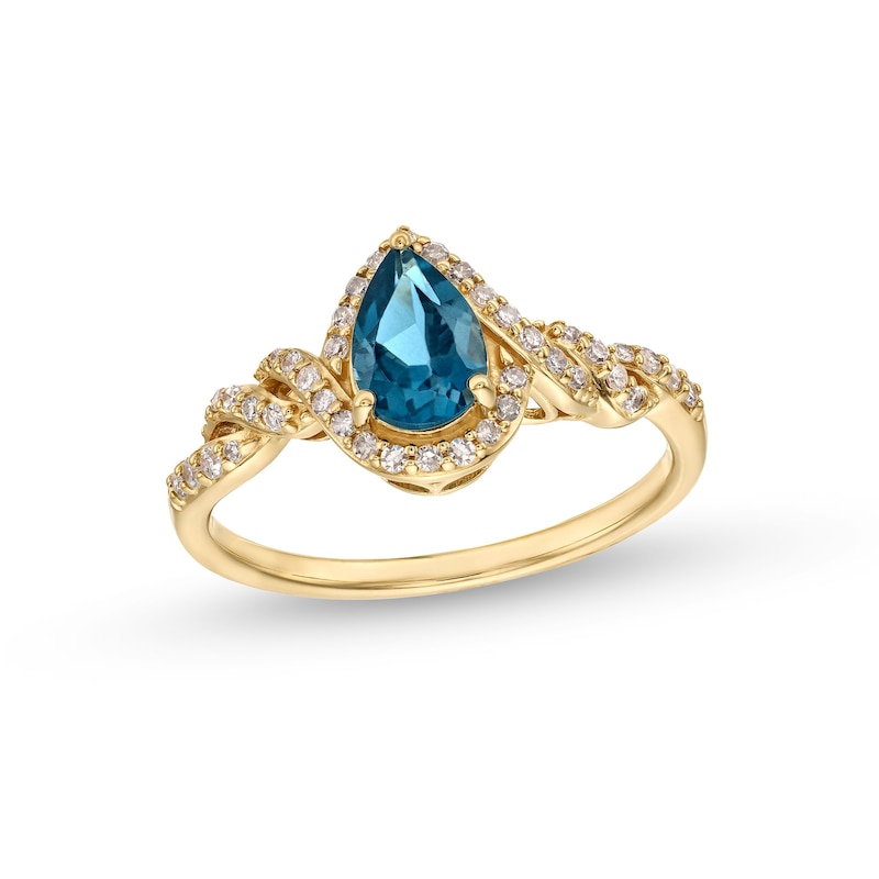 Main Image 1 of Pear-Shaped London Blue Topaz and 1/5 CT. T.W. Diamond Frame Twist Shank Ring in 10K Gold