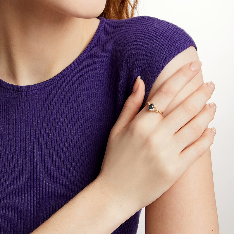 Main Image 2 of Pear-Shaped London Blue Topaz and 1/5 CT. T.W. Diamond Frame Twist Shank Ring in 10K Gold