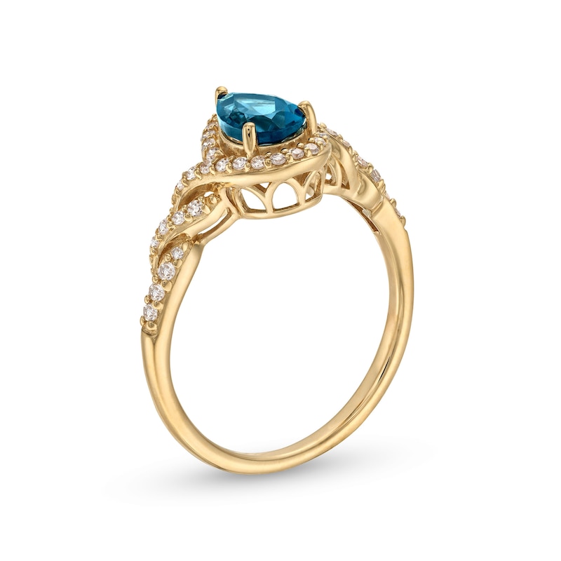 Main Image 3 of Pear-Shaped London Blue Topaz and 1/5 CT. T.W. Diamond Frame Twist Shank Ring in 10K Gold