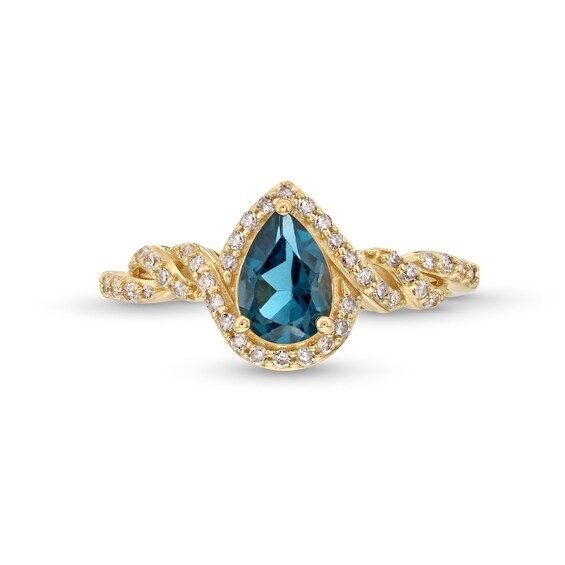 Pear-Shaped London Blue Topaz and 1/5 CT. T.w. Diamond Frame Twist Shank Ring in 10K Gold