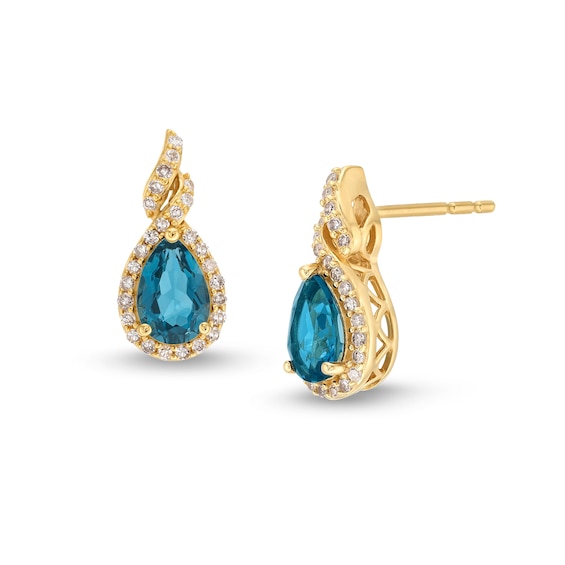 Pear-Shaped London Blue Topaz and 1/6 CT. T.w. Diamond Frame Twist Stud Earrings in 10K Gold