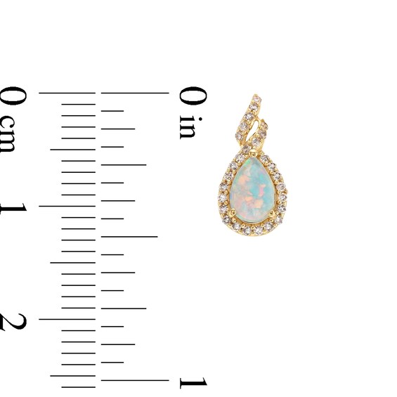 Pear-Shaped Lab-Created Opal and 1/6 CT. T.w. Diamond Frame Twist Stud Earrings in 10K Gold
